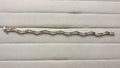 14K Diamond Wave Bracelet | Empire Jewelry and Loan