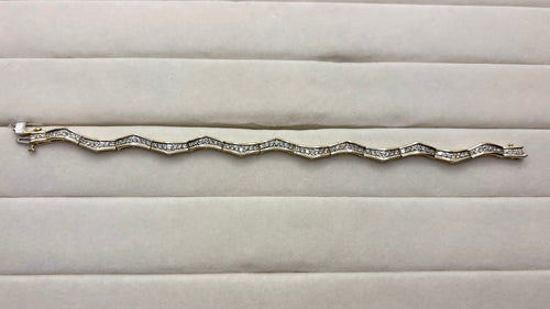 14K Diamond Wave Bracelet | Empire Jewelry and Loan