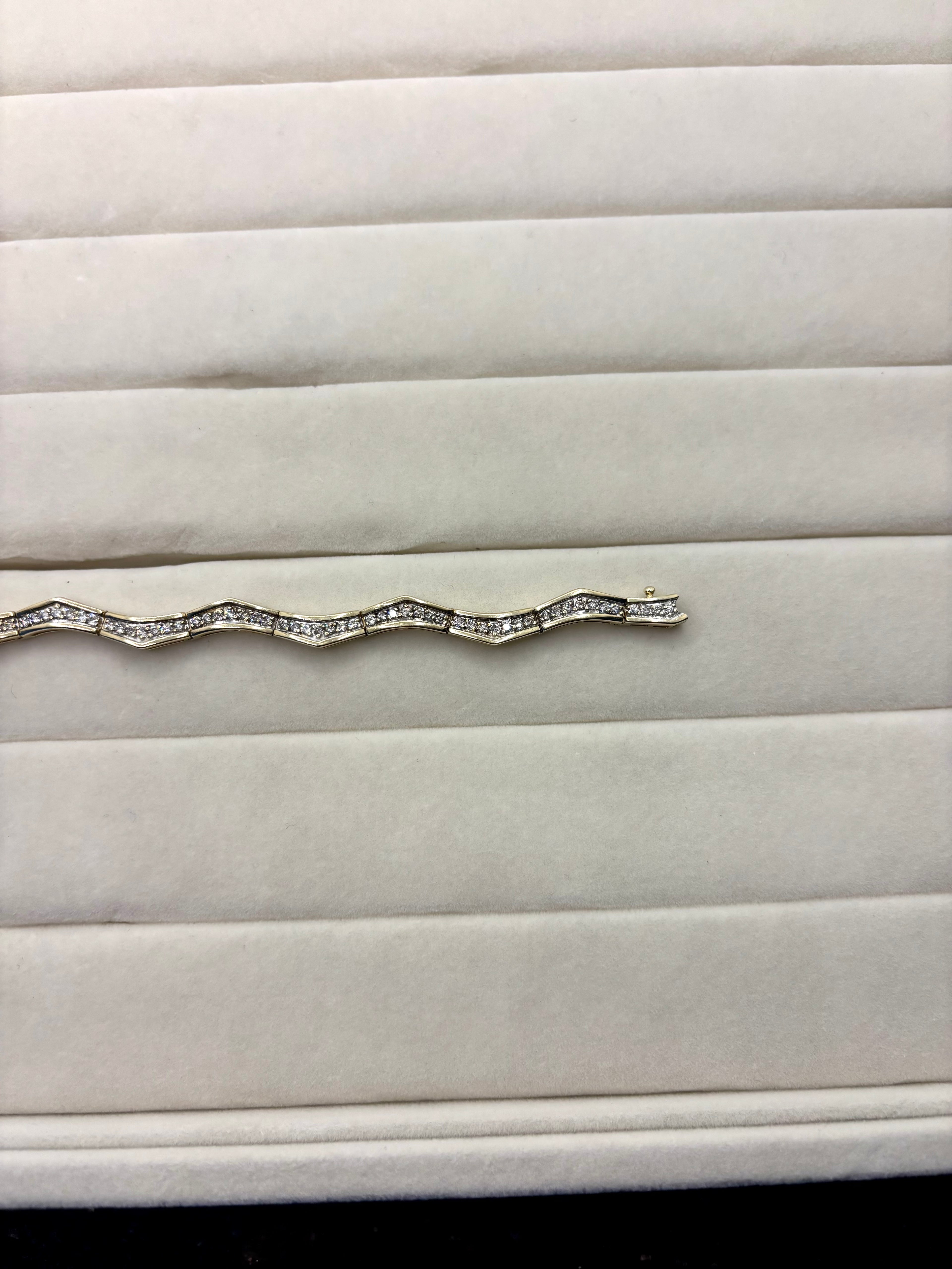 14K Diamond Wave Bracelet | Empire Jewelry and Loan