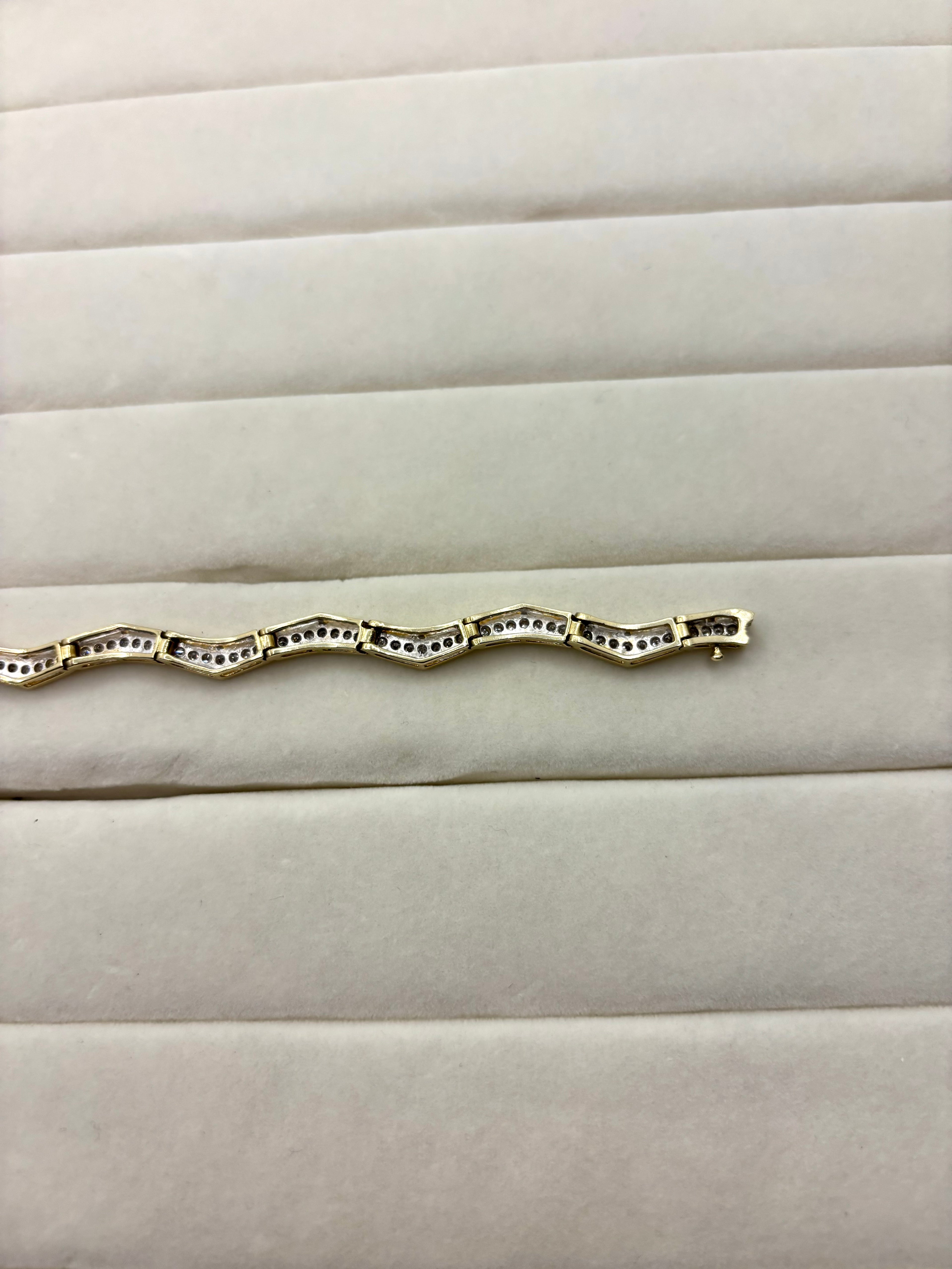 14K Diamond Wave Bracelet | Empire Jewelry and Loan