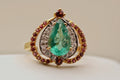 18K Gold Pear-Shaped Emerald Ring with Diamond and Pink Stone Accents