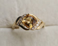 10k Yellow Gold Oval Yellow Gemstone and Diamond Ring